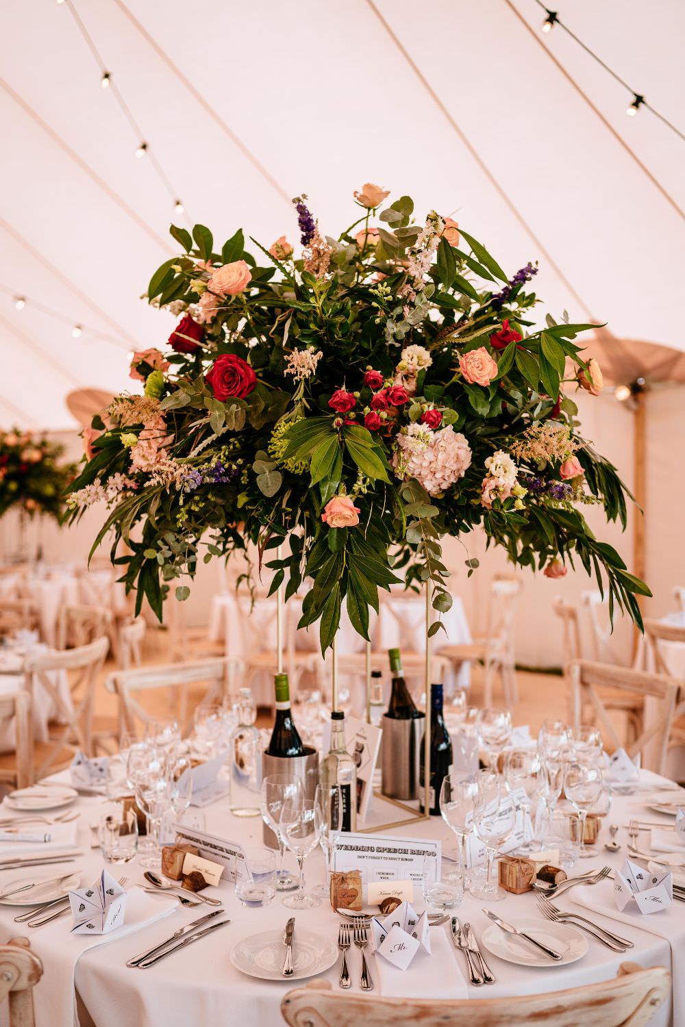 Pedestal Floral Arrangement Flowers Table Centre Festoon Lighting Sperry Tent Carousel Wedding Sarah Legge Photography