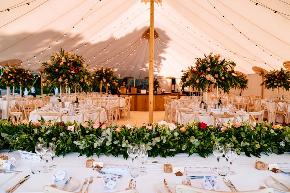 Greenery Runner Sperry Tent Florals Festoon Lighting Top Table Carousel Wedding Sarah Legge Photography