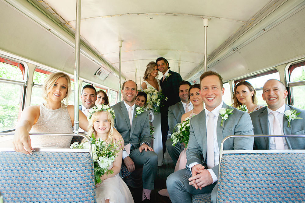 Bride bridal Fitted Fishtail Dress Gown Checked Suit Groom Group Shot Bus Countryside Barn Wedding Katrina Matthews Photography