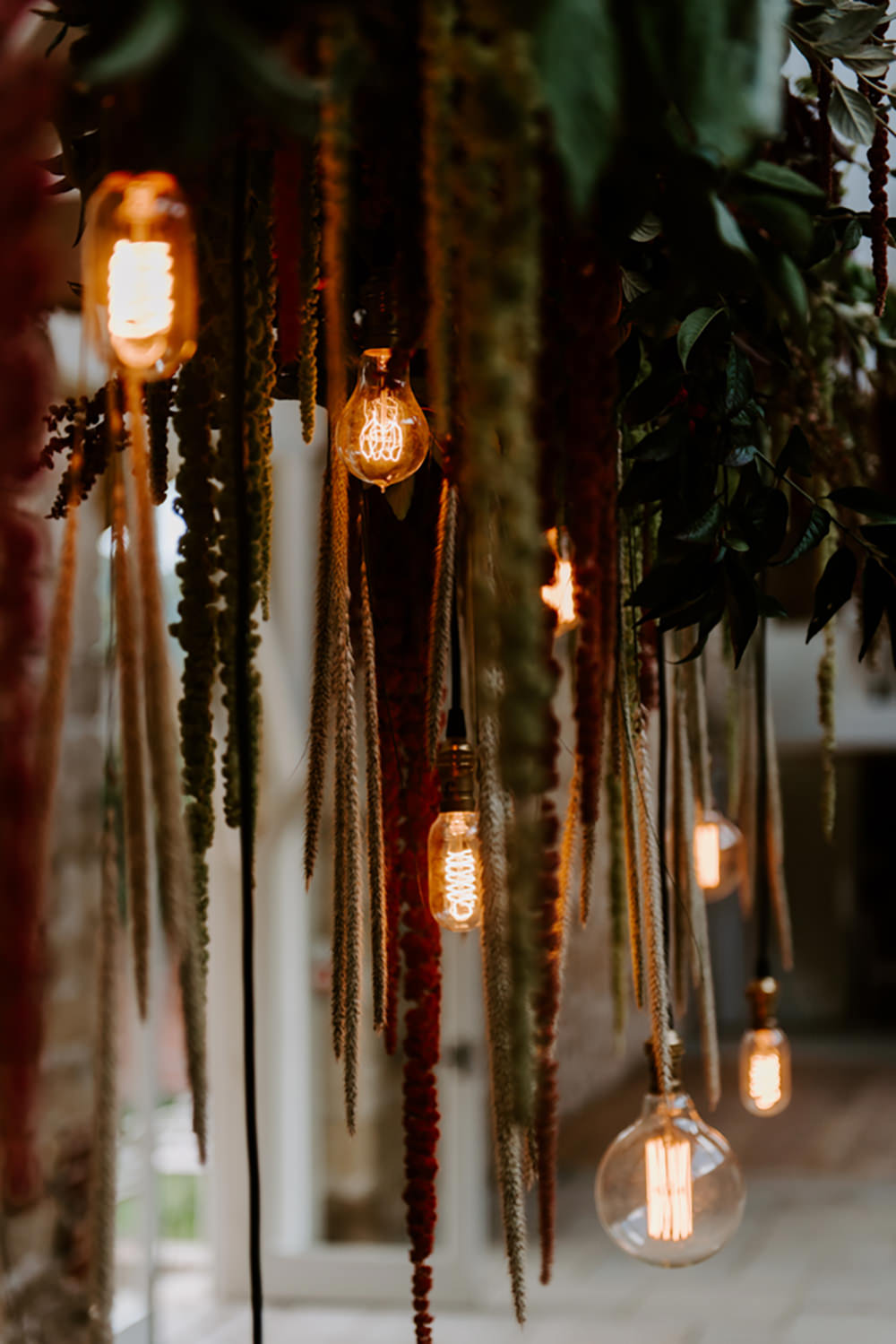 Table Tablescape Decor Decoration Autumn Fall Flowers Wooden Long Candles Dahlia Coral Greenery Suspended Hanging Flowers Foliage Light Bulbs Lighting Ethical Wedding Ideas Sadie Osborne Photography