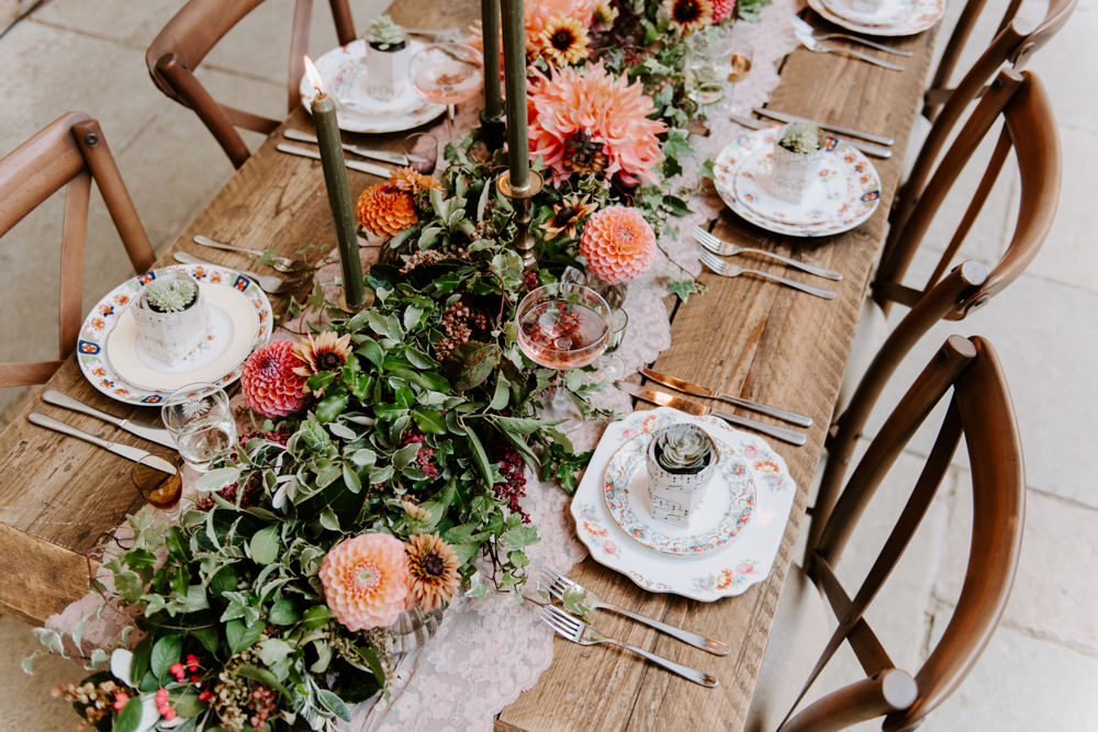 Table Tablescape Decor Decoration Autumn Fall Flowers Wooden Long Candles Dahlia Coral Greenery Suspended Hanging Flowers Foliage Light Bulbs Lighting Ethical Wedding Ideas Sadie Osborne Photography