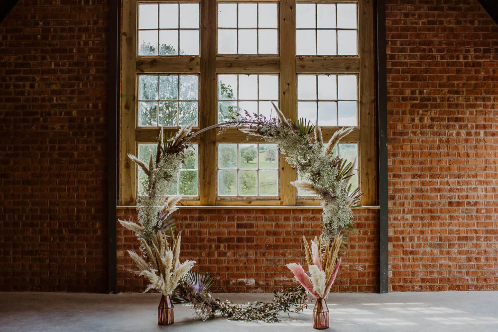 Moon Gate Flower Arch Pampas Grass Backdrop Ceremony Venue Giraffe Shed Wedding When Charlie Met Hannah