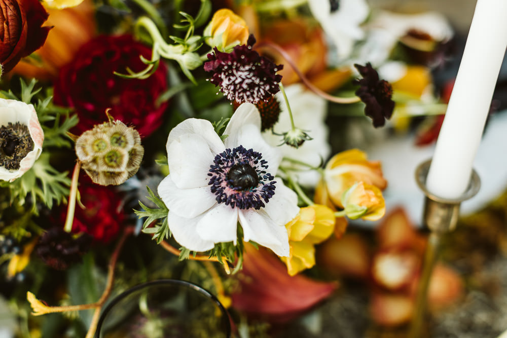 Table Flowers Centrepiece Anemone Amaranthus Ranunculus Greenery Foliage Red Burgundy Halloween Wedding Ideas Megan Morales Photography