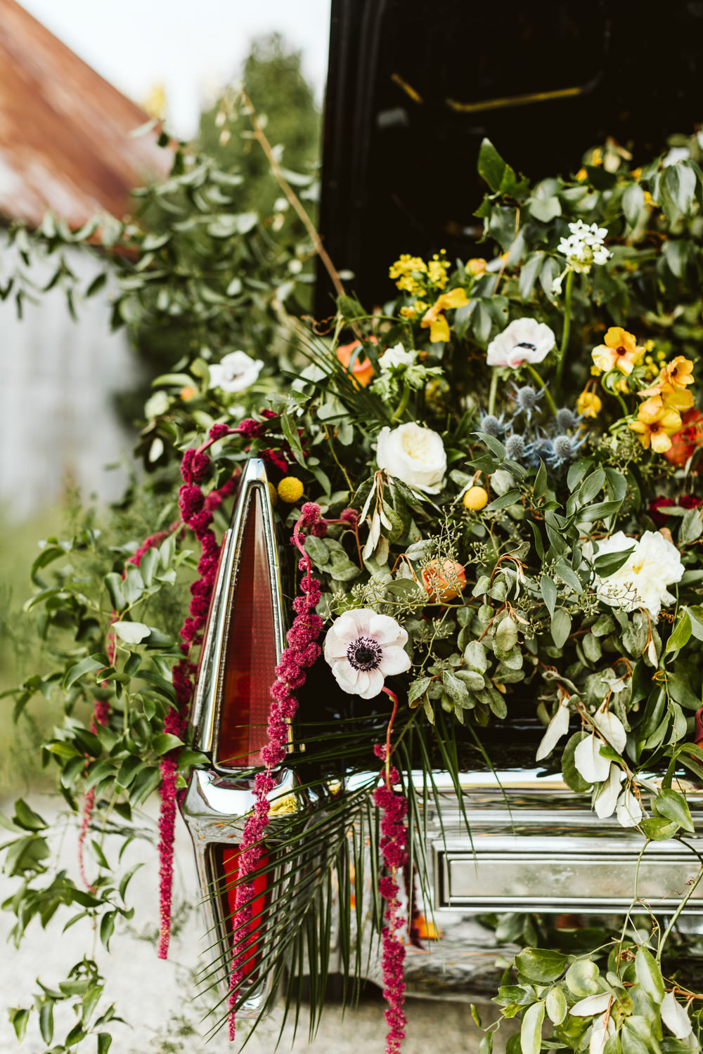 Car Flowers Centrepiece Anemone Amaranthus Ranunculus Greenery Foliage Red Burgundy Halloween Wedding Ideas Megan Morales Photography