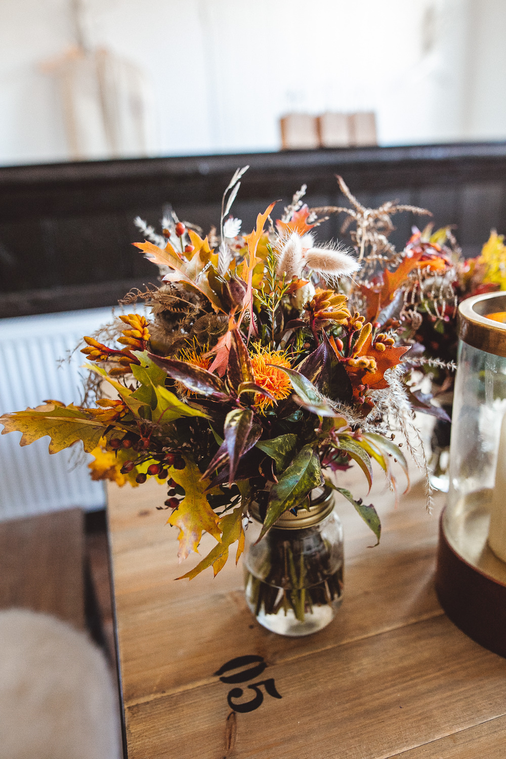 Bouquet Flowers Bride Bridal Orange Leaf Leaves Autumn Seeds Greenery Foliage Halloween Wedding Nicola Casey Photography