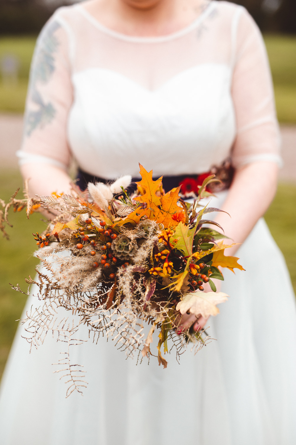 Bouquet Flowers Bride Bridal Orange Leaf Leaves Autumn Seeds Greenery Foliage Halloween Wedding Nicola Casey Photography