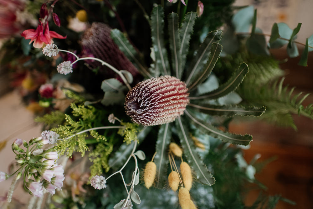 Table Flowers Arrangement King Protea Greenery Foliage Wild Henry Moore Wedding Ellie Gillard Photography