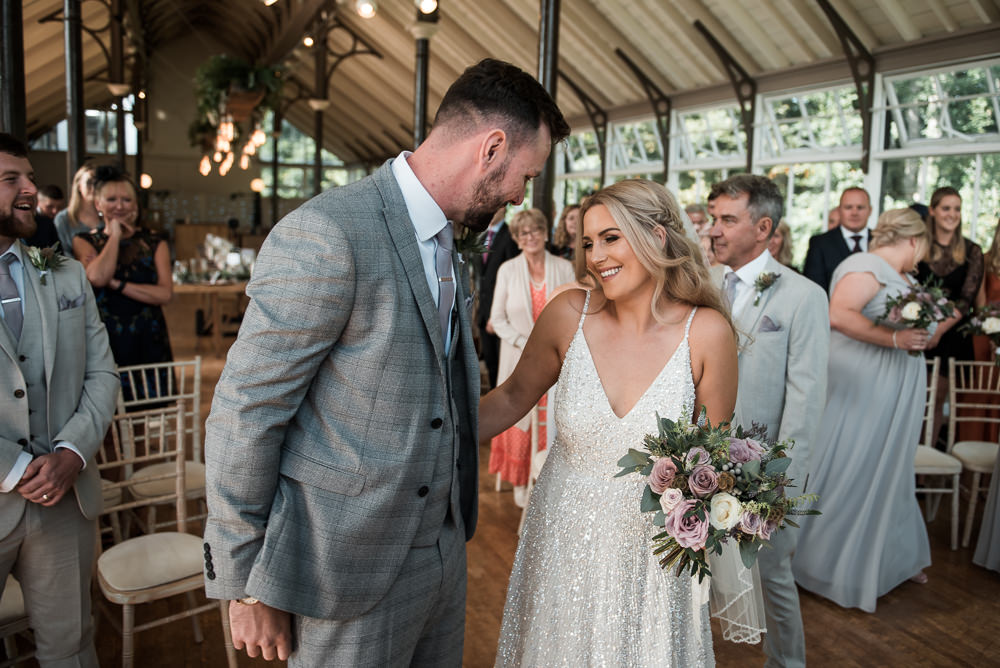 Bride Bridal Strappy Sparkly Sequin V Neck White ASOS Dress Gown Grey Checked Suit Three Piece Waistcoat Groom Hexham Winter Gardens Wedding Leighton Bainbridge Photography