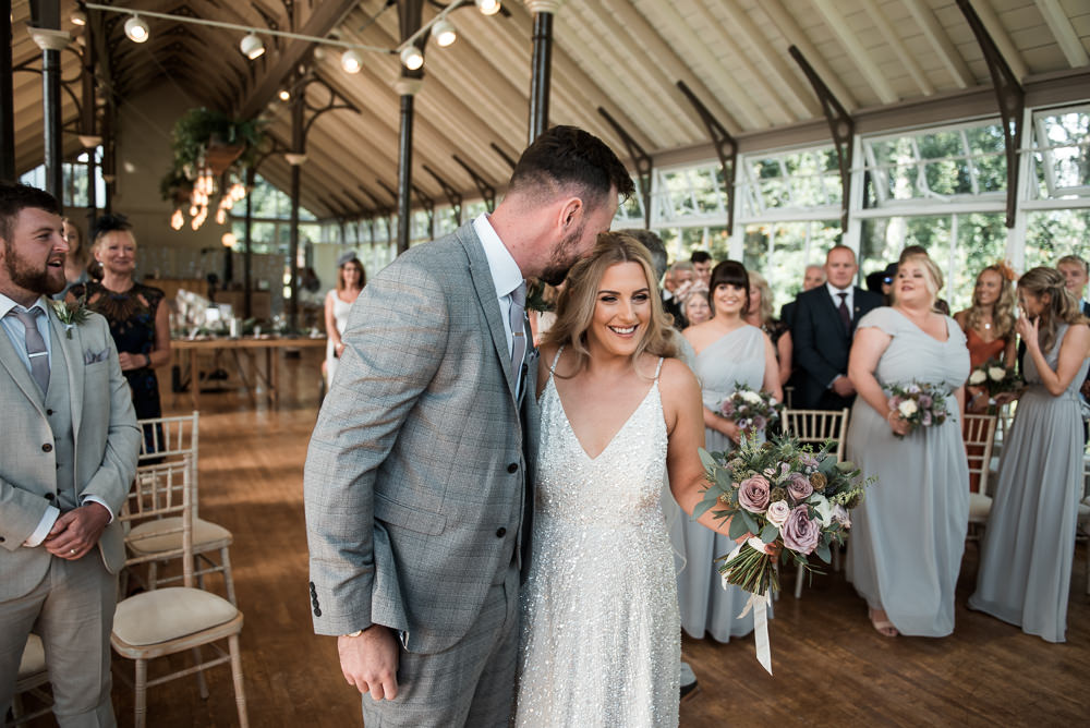 Bride Bridal Strappy Sparkly Sequin V Neck White ASOS Dress Gown Grey Checked Suit Three Piece Waistcoat Groom Hexham Winter Gardens Wedding Leighton Bainbridge Photography
