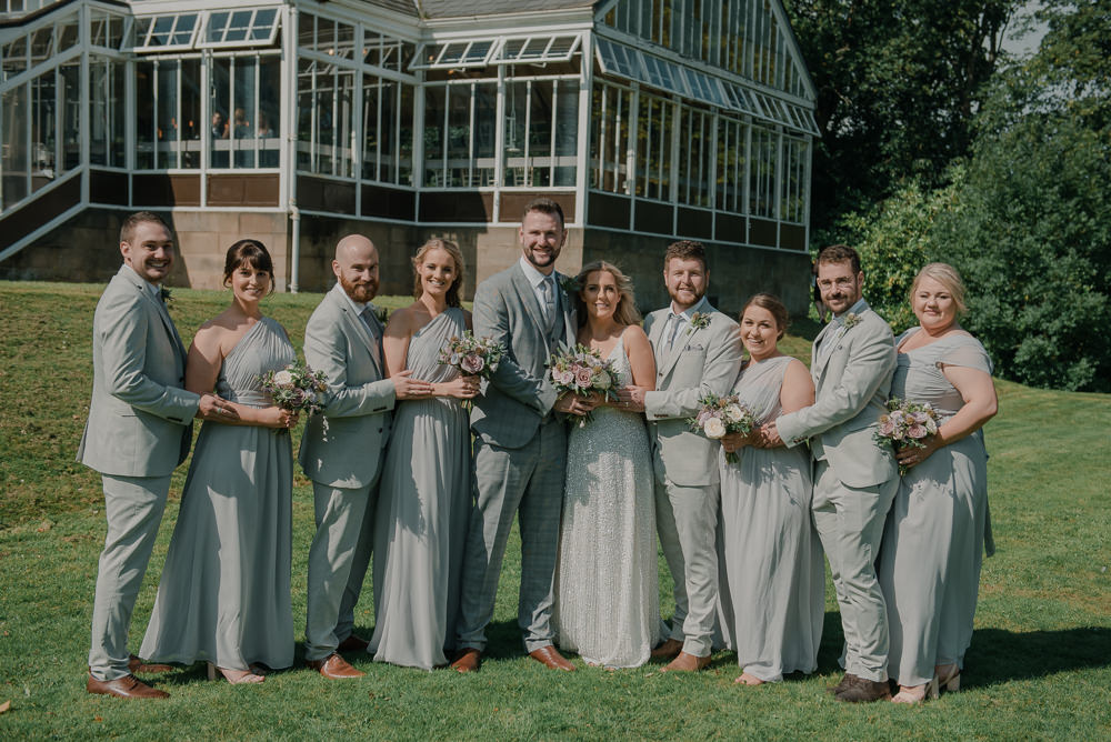 Bride Bridal Strappy Sparkly Sequin V Neck White ASOS Dress Gown Grey Checked Suit Three Piece Waistcoat Groom Groomsmen Sage Bridesmaids One Shoulder Hexham Winter Gardens Wedding Leighton Bainbridge Photography