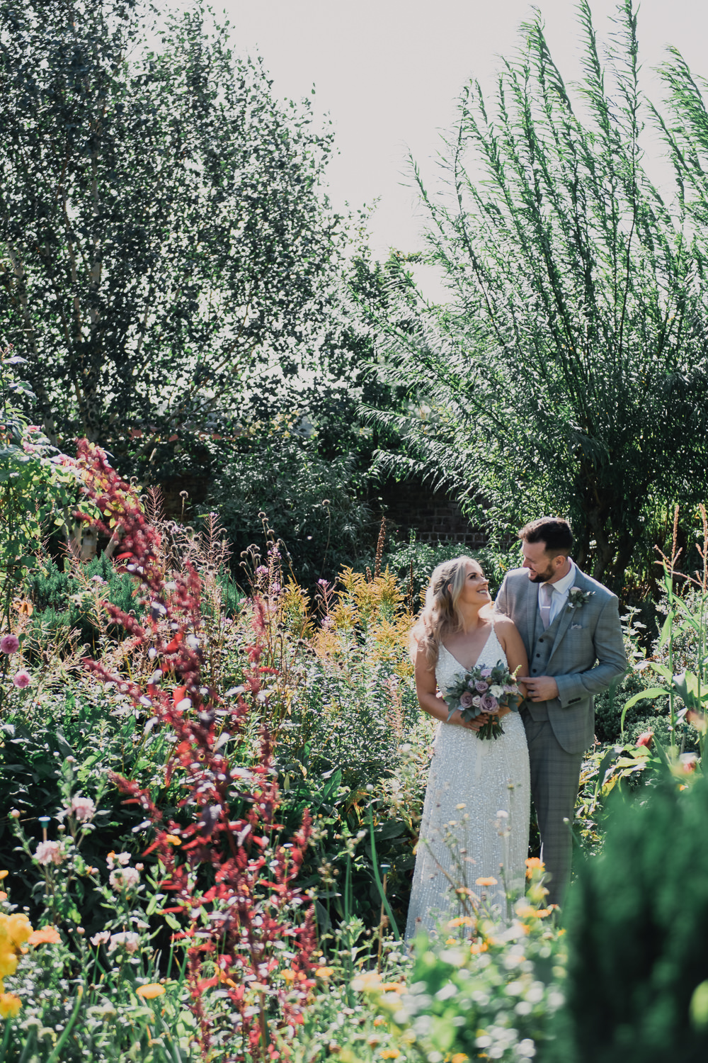 Bride Bridal Strappy Sparkly Sequin V Neck White ASOS Dress Gown Grey Checked Suit Three Piece Waistcoat Groom Hexham Winter Gardens Wedding Leighton Bainbridge Photography