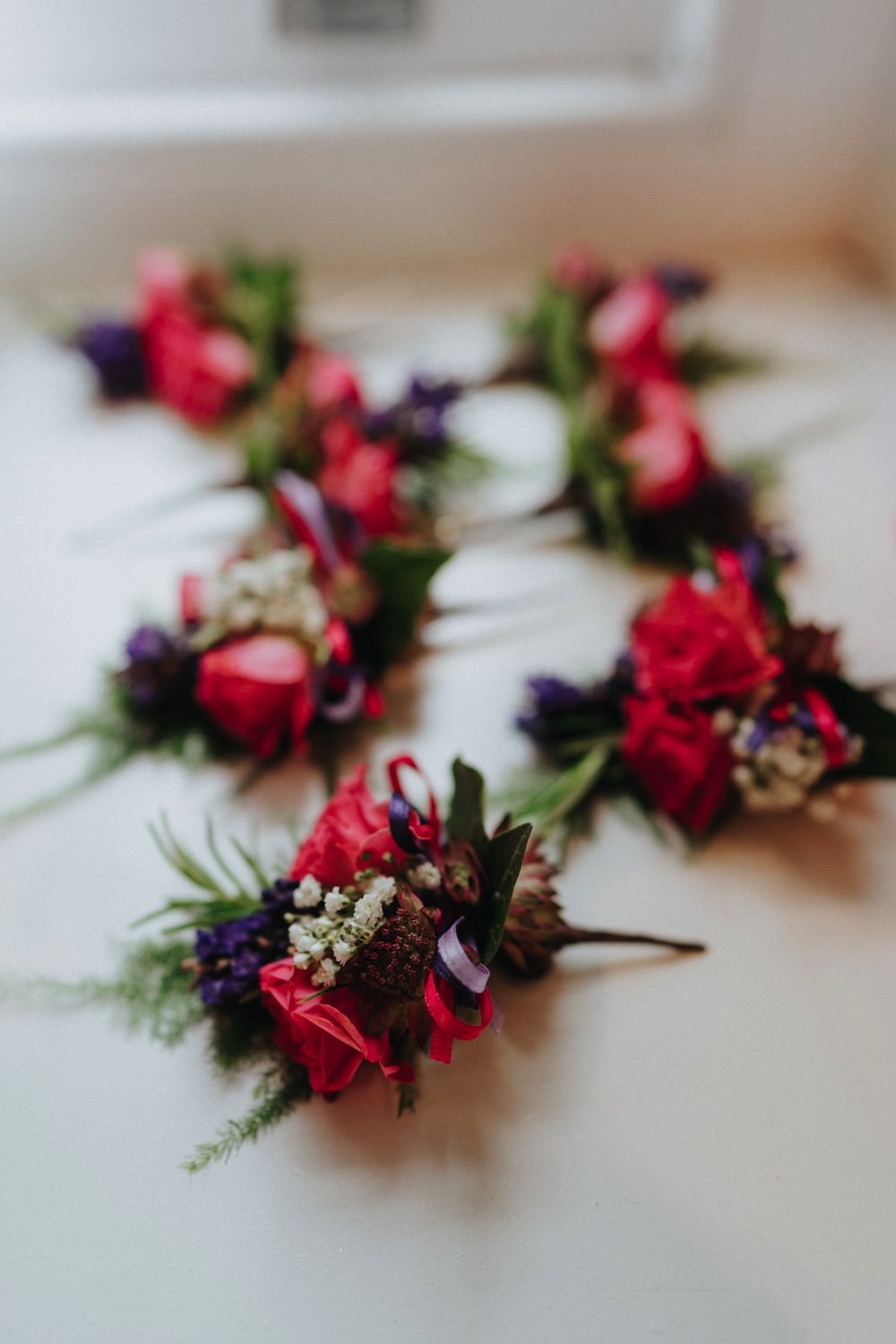 Pin Purple Buttonhole Boutonnière High Barn Wedding Edenhall Bloom Weddings
