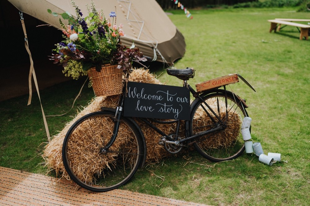 Bike Bicycle Welcome Sign Chalkboard Florals Hay Bale Tipi High Barn Wedding Edenhall Bloom Weddings