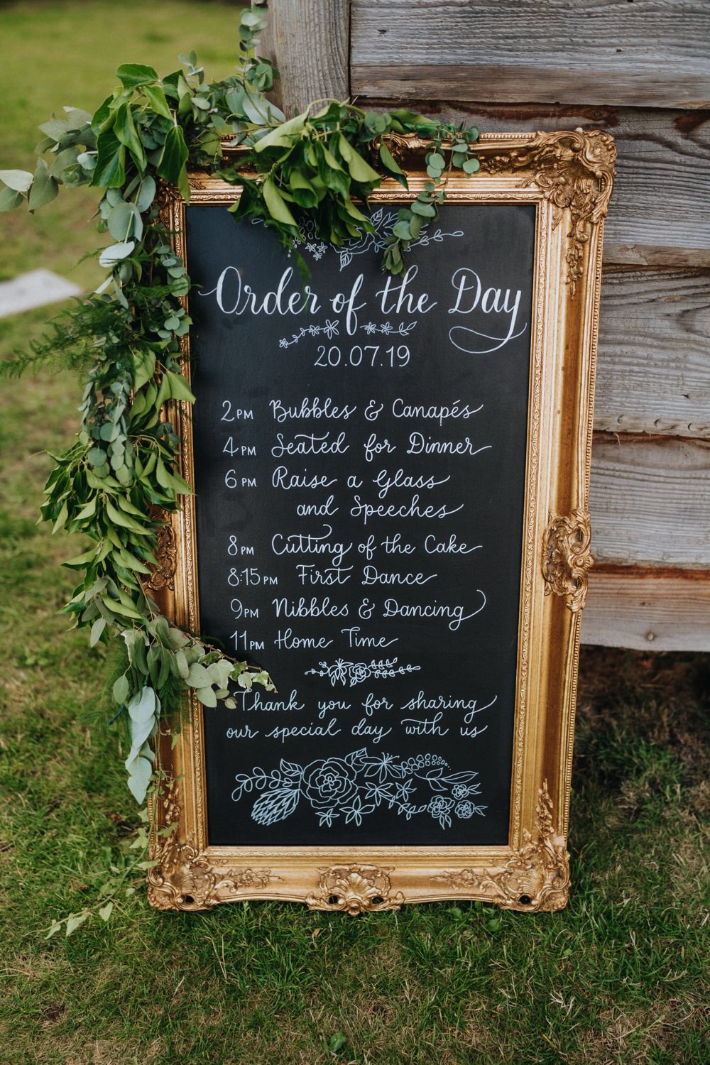 Chalkboard Gold Frame Order of the Day Foliage High Barn Wedding Edenhall Bloom Weddings