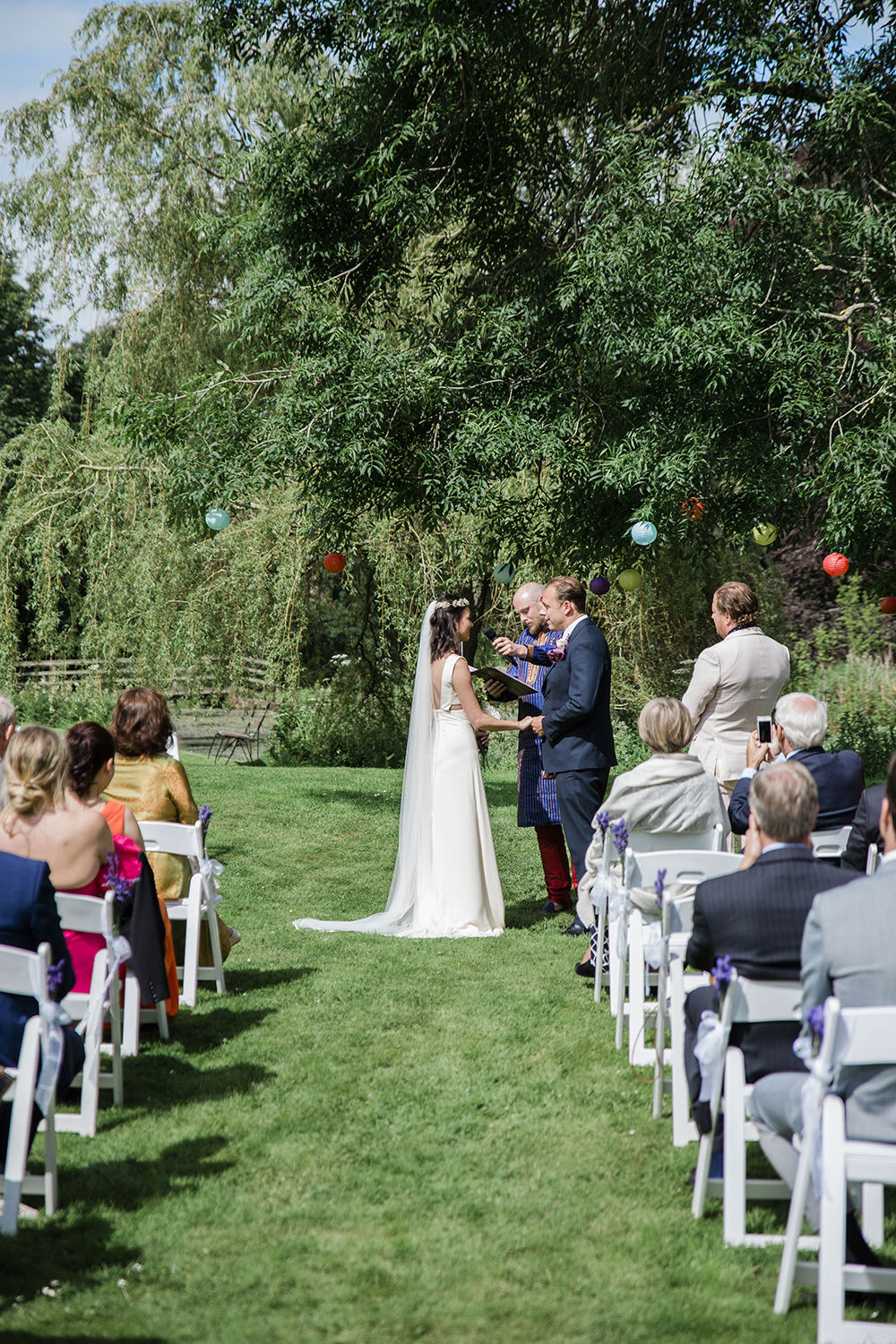Bride Bridal Boat Neck Cut Out Dress Gown Flower Floral Crown Veil Navy Suit Groom Outdoor Ceremony Marquee Castle Wedding Rachael Fraser Photography