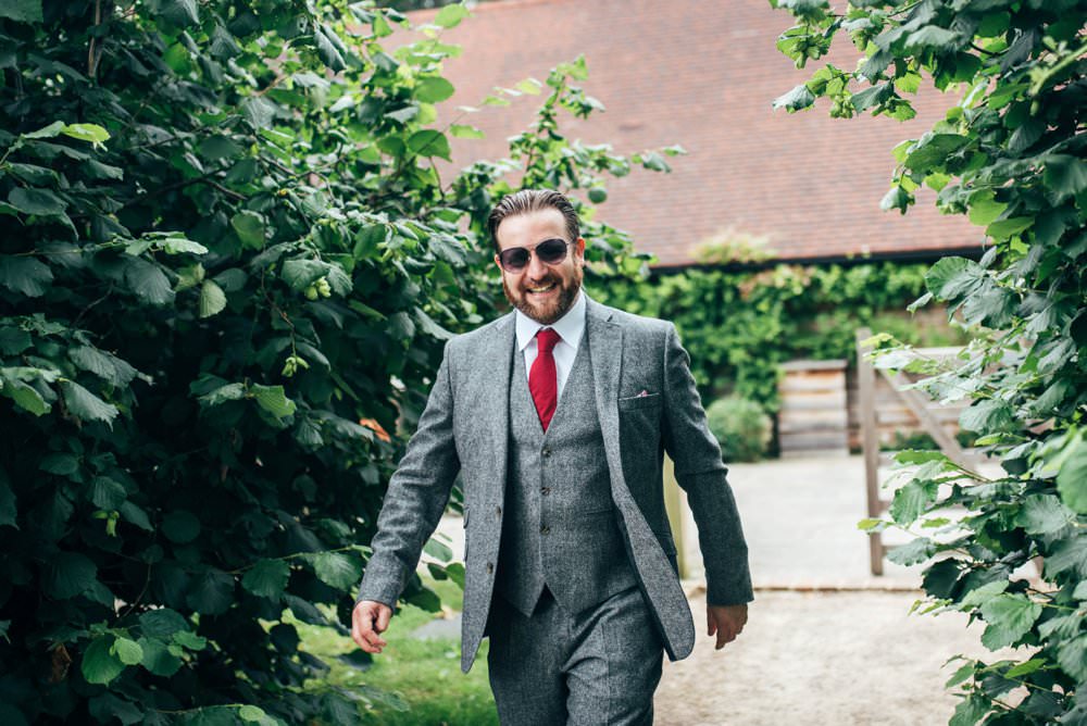 Groom Suit Tweed Grey Tie Pink Red Wedding Three Flowers Photography