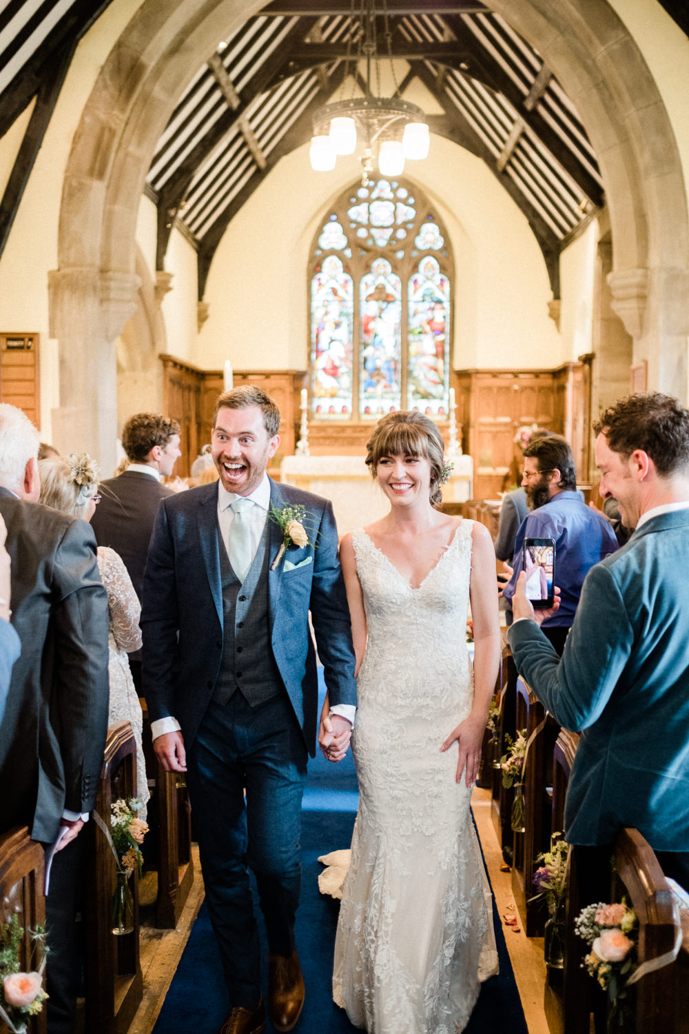 Bride Bridal Low V Neck Back Gown Dress Navy Three Piece Waistcoat Suit Groom Utopia Broughton Hall Wedding Christopher Thomas Photography