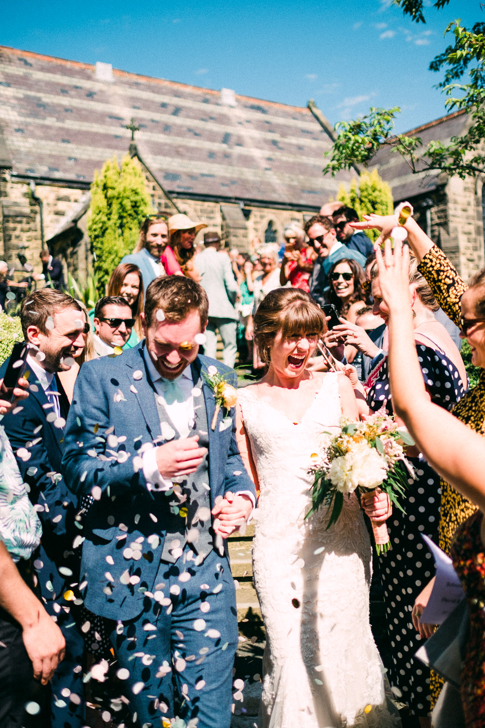 Bride Bridal Low V Neck Back Gown Dress Navy Three Piece Waistcoat Suit Groom Confetti Utopia Broughton Hall Wedding Christopher Thomas Photography
