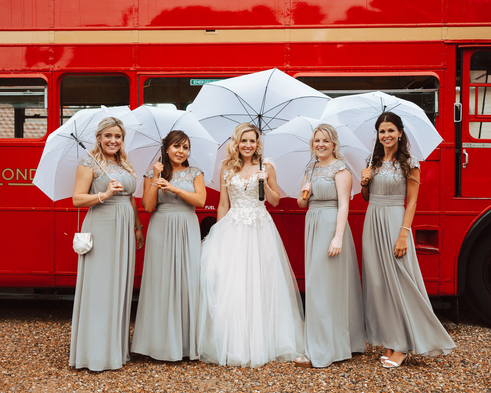 Bride Bridal Blush Embroidered Floral Strappy V Neck Tulle Dress Gown Mauve Bridesmaids Umbrellas Willingale Village Hall Wedding Photographer Liam Gillan