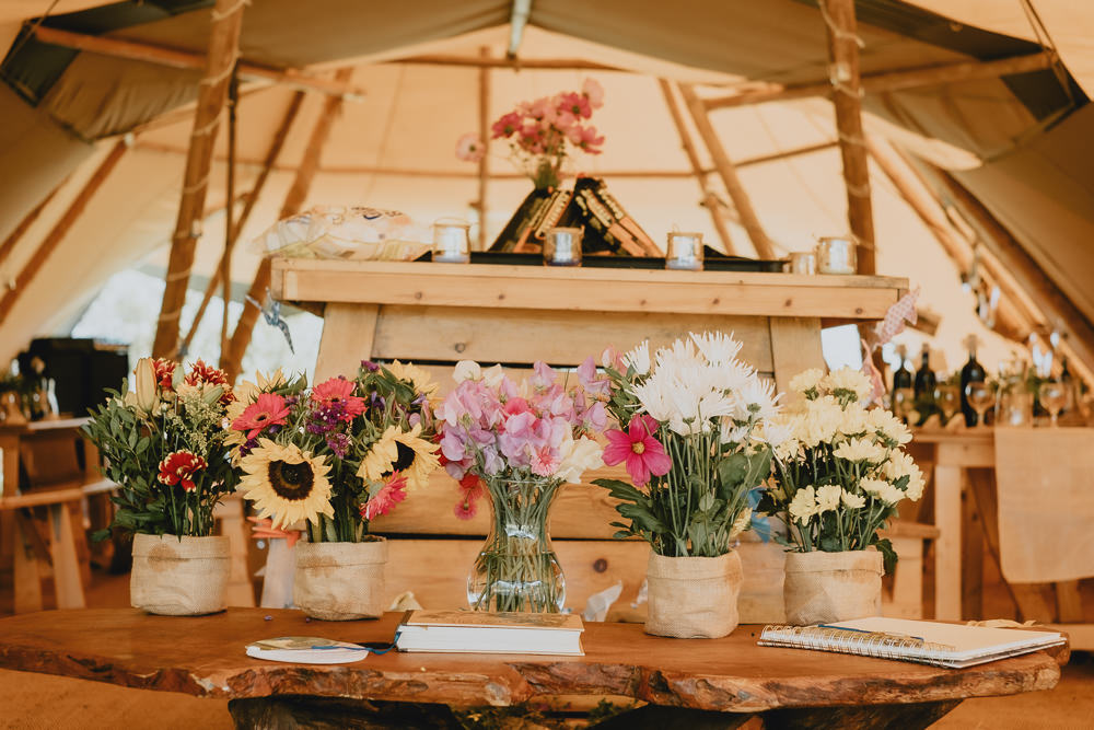 Sweet Pea Sunflower Hessian Flower Troughs Tipi Woodland Tipi Wedding Caroline Goosey Photography