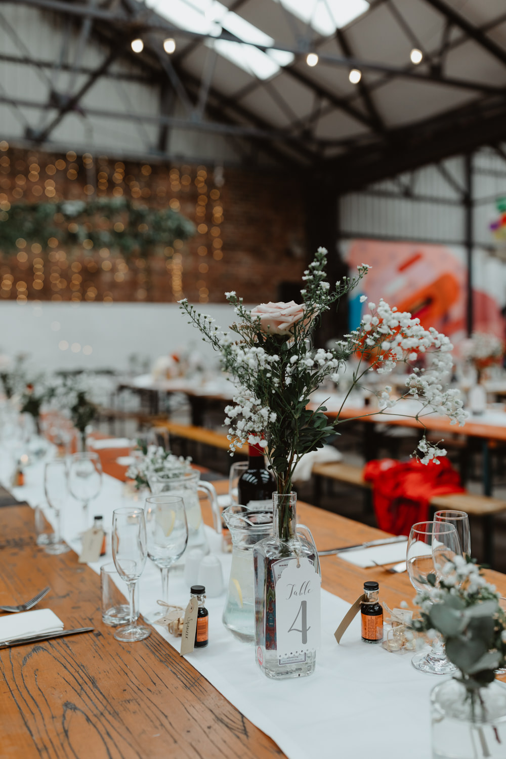 Reception Venue Industrial Warehouse Benches Long Tables Flowers Decor Decoration Runners Festoon Lights 92 Burton Road Wedding Stevie Jay Photography