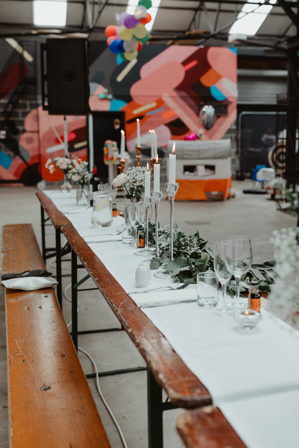 Reception Venue Industrial Warehouse Benches Long Tables Flowers Decor Decoration Runners Festoon Lights Candles 92 Burton Road Wedding Stevie Jay Photography