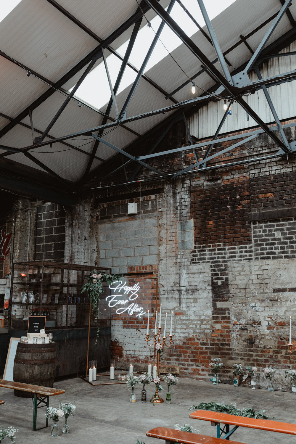 Ceremony Venue Industrial Warehouse Benches Flowers Aisle Pew End 92 Burton Road Wedding Stevie Jay Photography