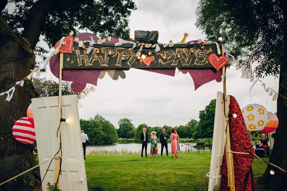 Entrance Doorway Arch Doors Sign Signage Signs Backdrop Alderford Lake Wedding Amy B Photography