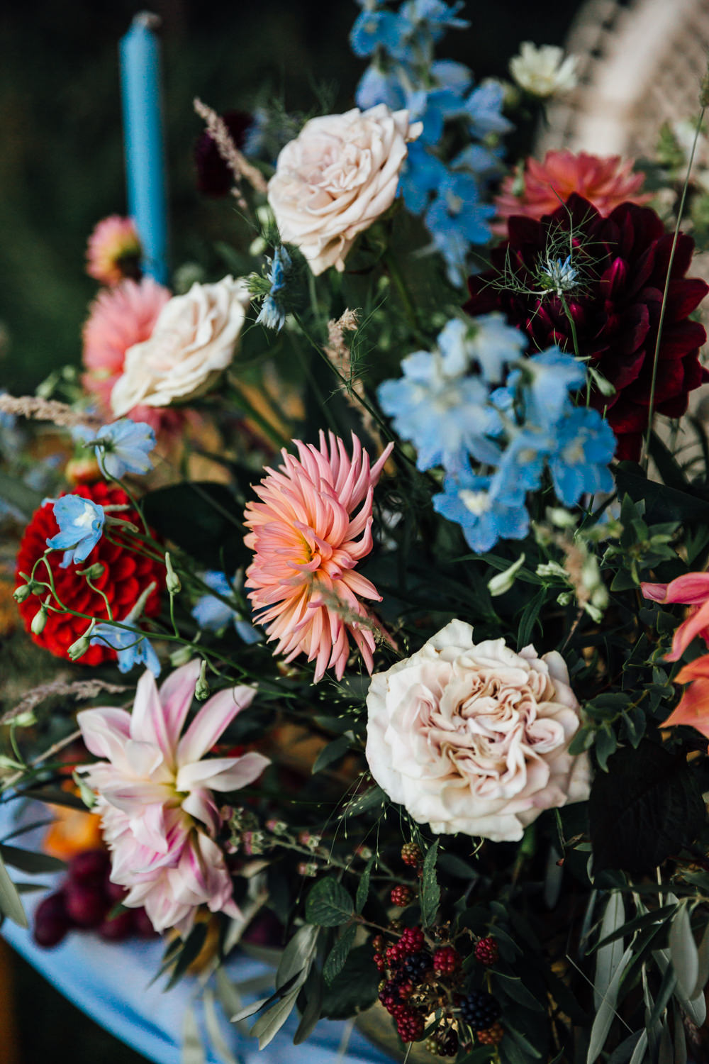 Table Flowers Centrepiece Pink Red Dahlias Blue Ribbon Delphiniums Autumn Festival Wedding Ideas Indigo and Violet Photography