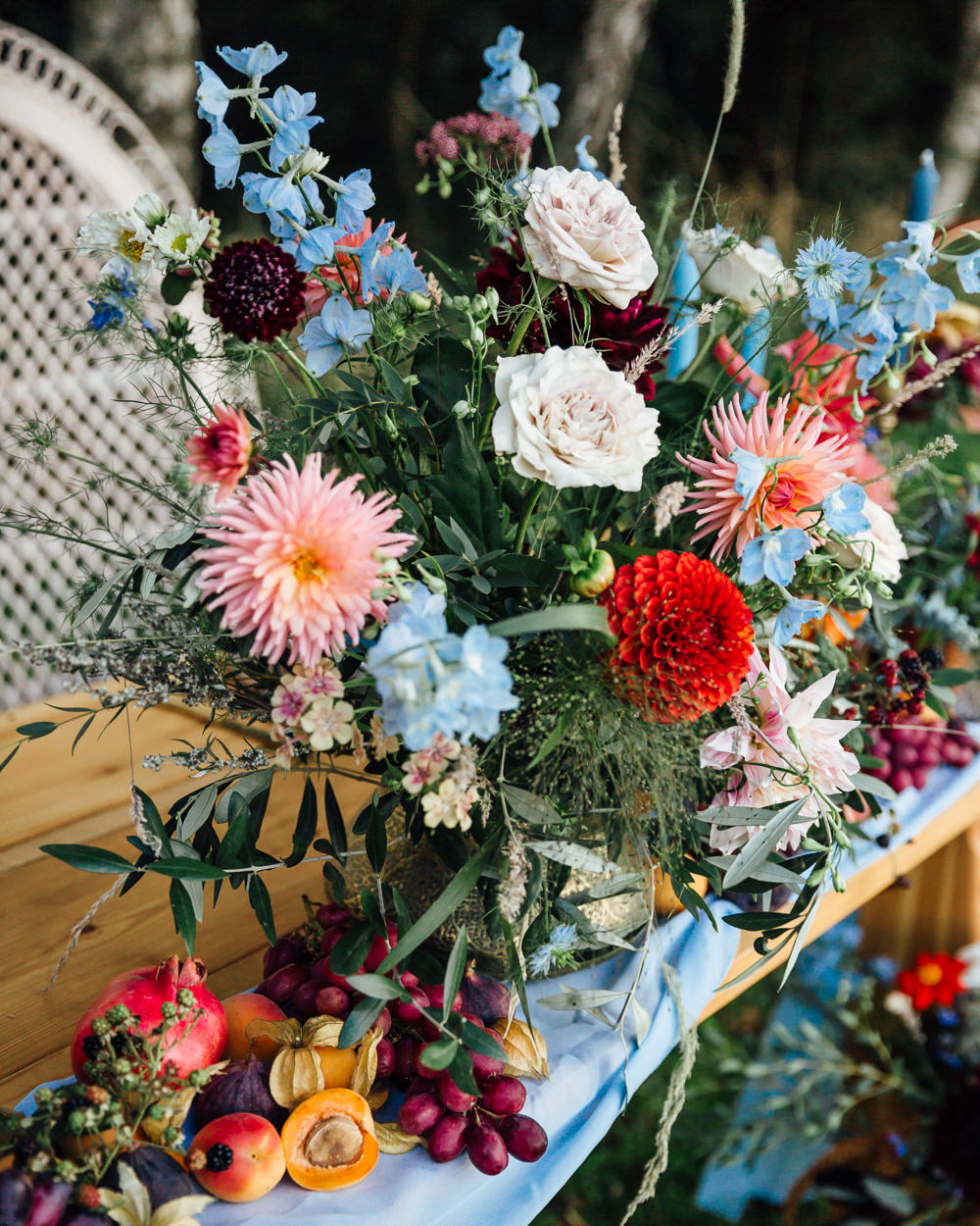 Table Flowers Centrepiece Pink Red Dahlias Blue Ribbon Delphiniums Autumn Festival Wedding Ideas Indigo and Violet Photography