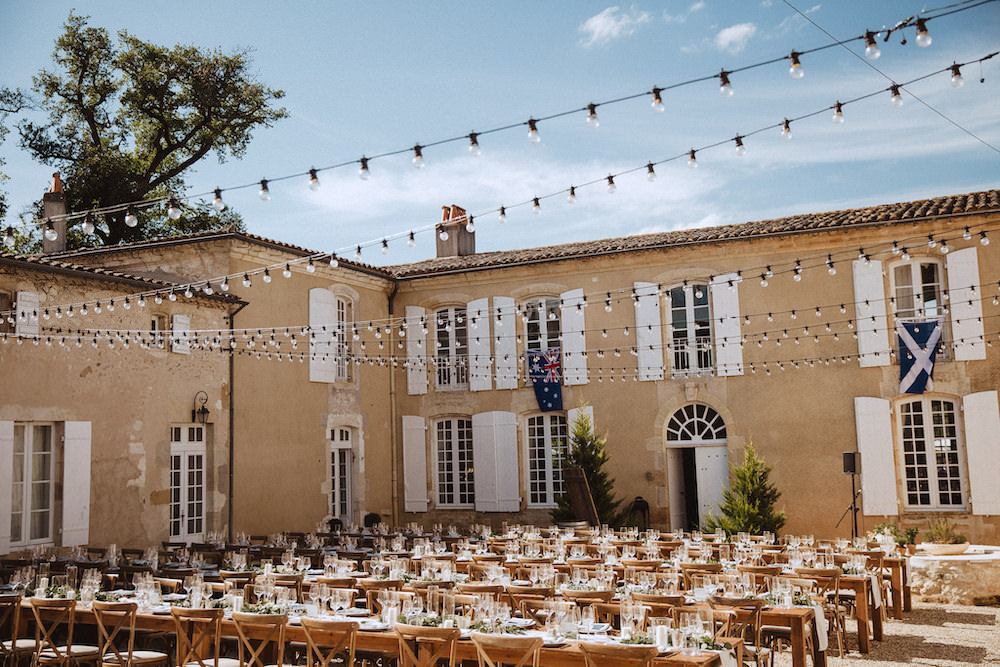 Outdoor Reception Festoon Lights Lighting Long Tables French Chateau Wedding Red On Blonde Photography