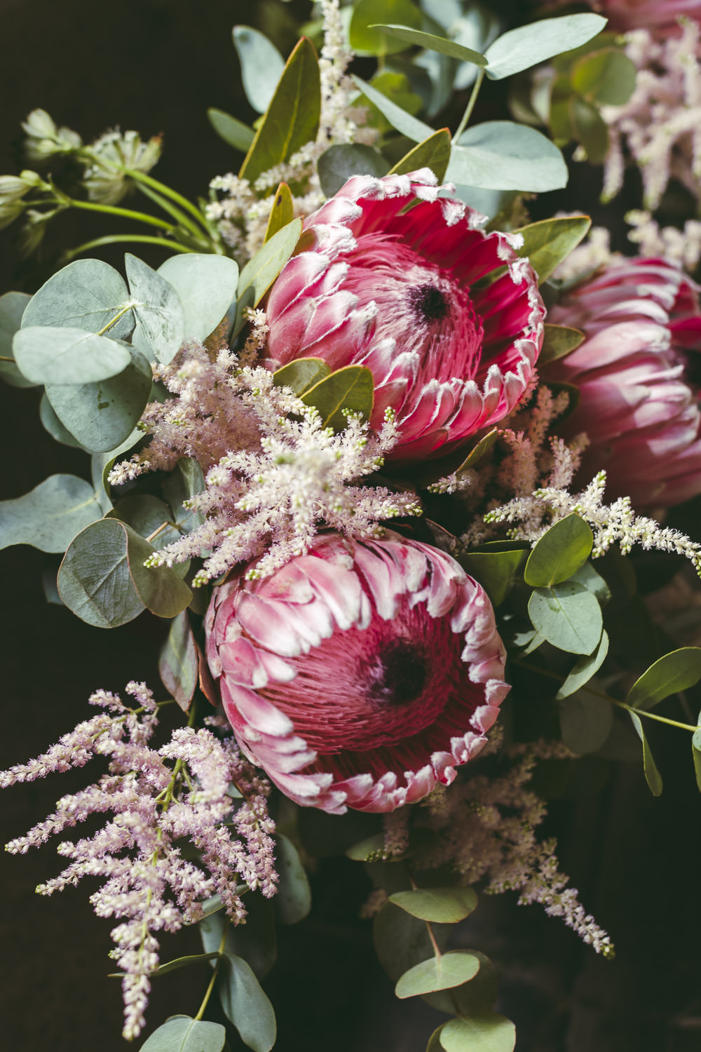 Large Oversized Cascading Bouquet Flowers Bride Bridal Greenery Foliage Protea Astilbe Kingshill Barn Wedding Sandra Reddin Photography