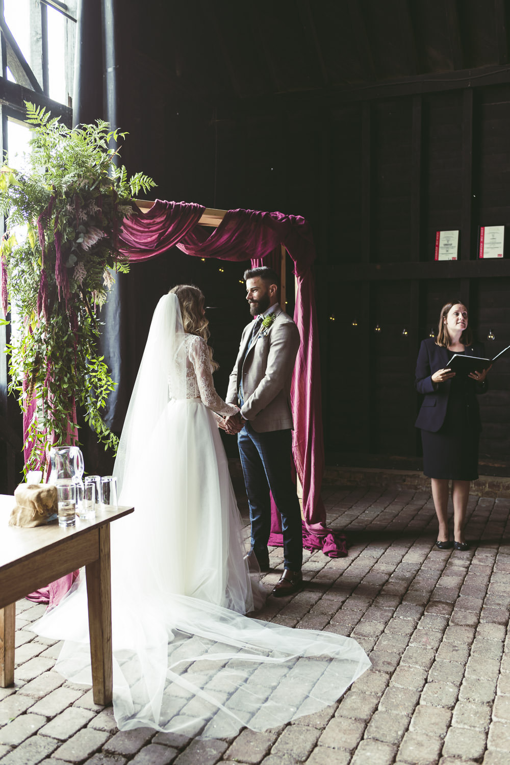 Ceremony Backdrop Flower Arch Fabric Greenery Foliage Aisle Kingshill Barn Wedding Sandra Reddin Photography