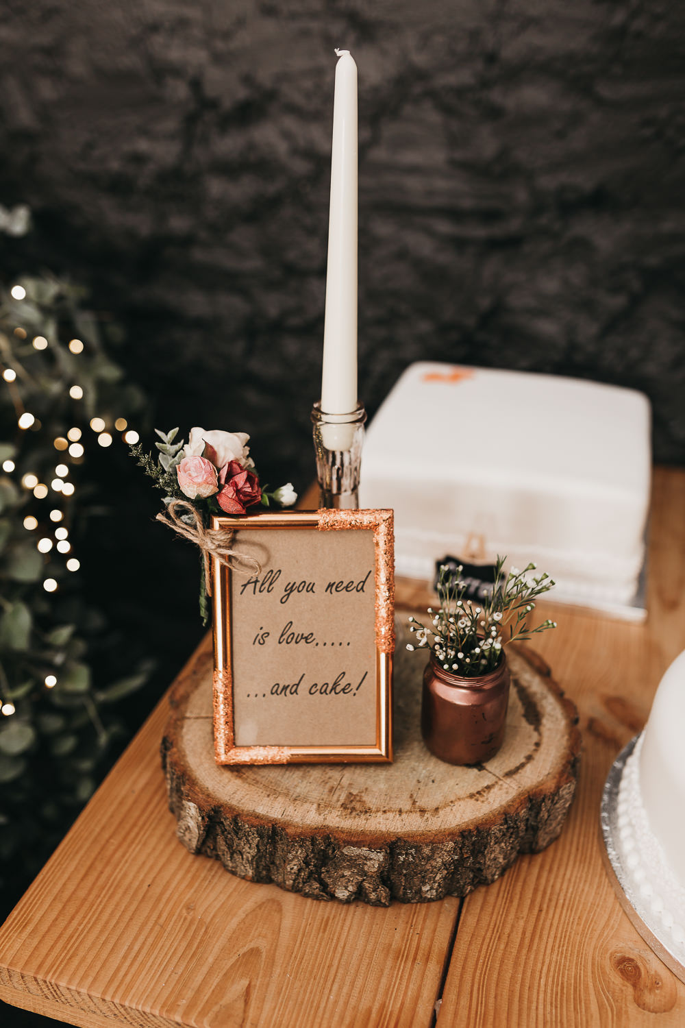 All You Need Is Love And Cake Sign Candle Wood Log Slice Flowers Floral Llys Meddyg Wedding Hannah Miles Photography