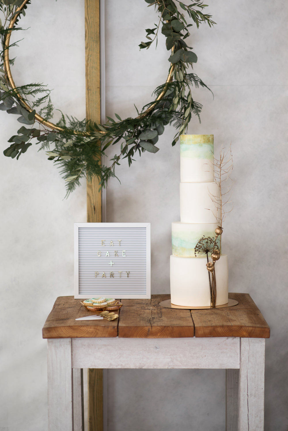 Cake Iced Tall Green Gold Painted Watercolour Flower Heads Wreath Table Felt Peg Board Sign Signage Signs Minimalist Wedding Ideas Nicola Belson Photography
