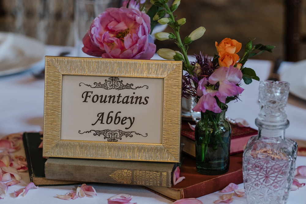 Table Name Centrepiece Books Flowers Petals Oakwell Hall Wedding Jenna Kathleen Photographer