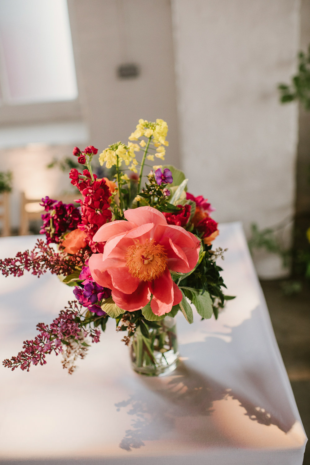Bottle Flowers Table Decor Centrepiece Spring Coral Peony Natural Wild Colourful Riverside London Wedding Ellie Gillard Photography