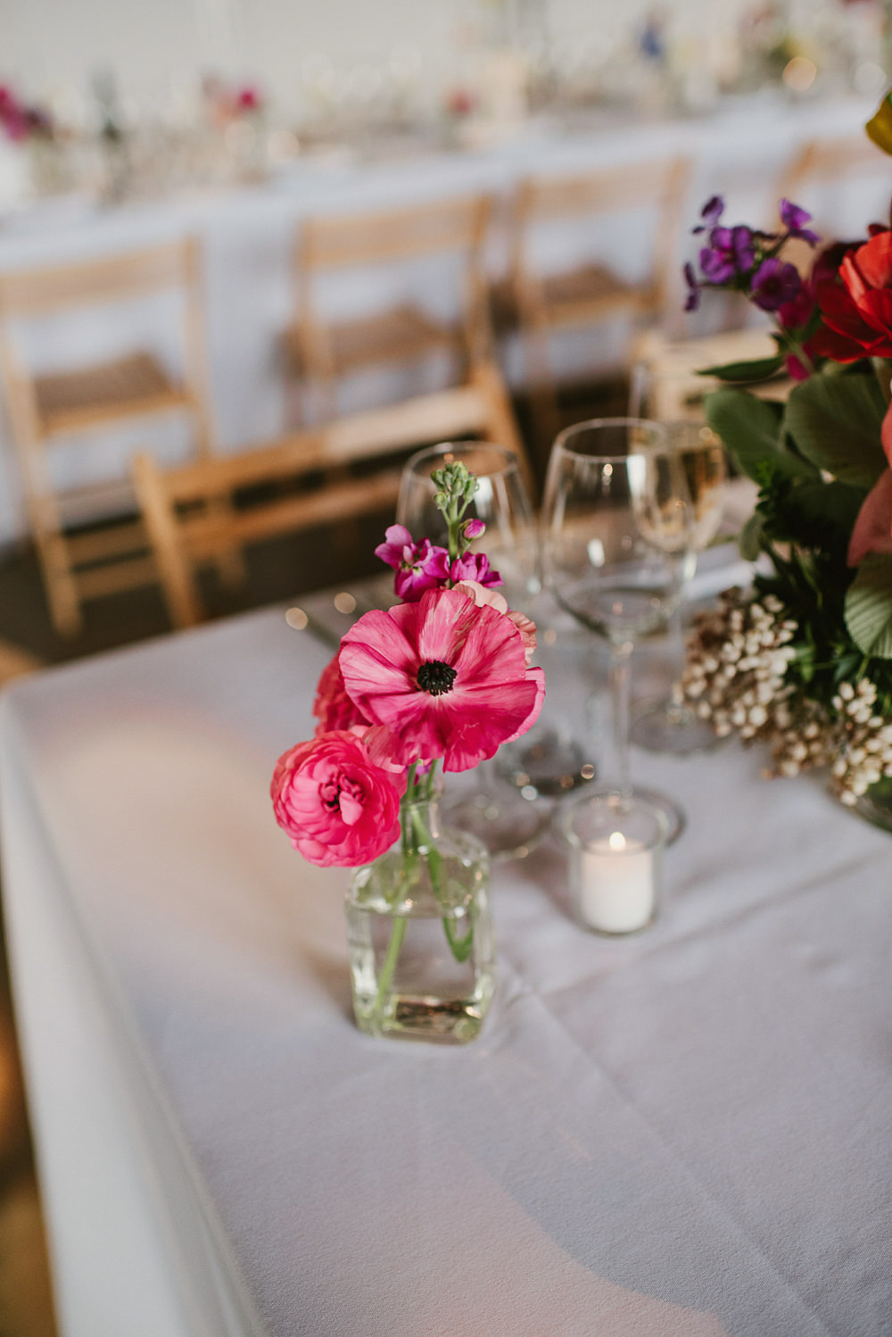 Bottle Flowers Table Decor Centrepiece Spring Poppy Natural Wild Colourful Riverside London Wedding Ellie Gillard Photography