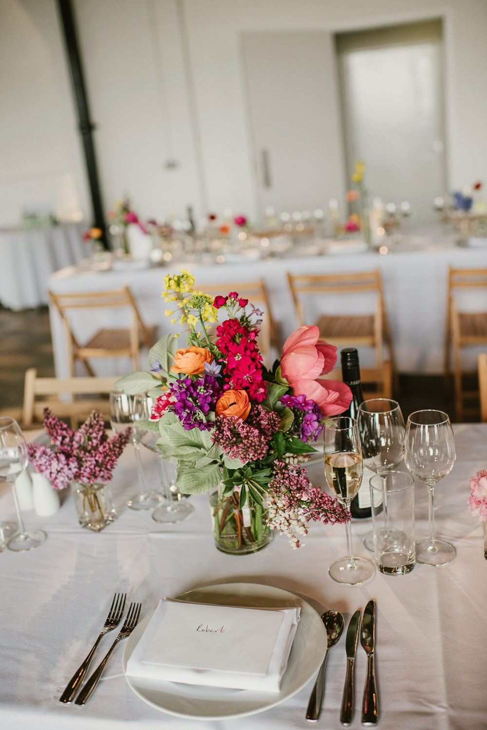 Bottle Flowers Table Decor Centrepiece Spring Coral Peony Natural Wild Colourful Riverside London Wedding Ellie Gillard Photography