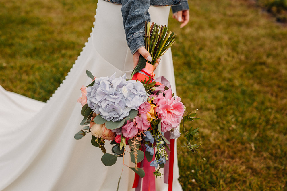 Bouquet Flowers Bride Bridal Coral Peony Peonies Pink Rose Ribbons Delphinium Hydrangea South Farm Wedding Miracle Moments