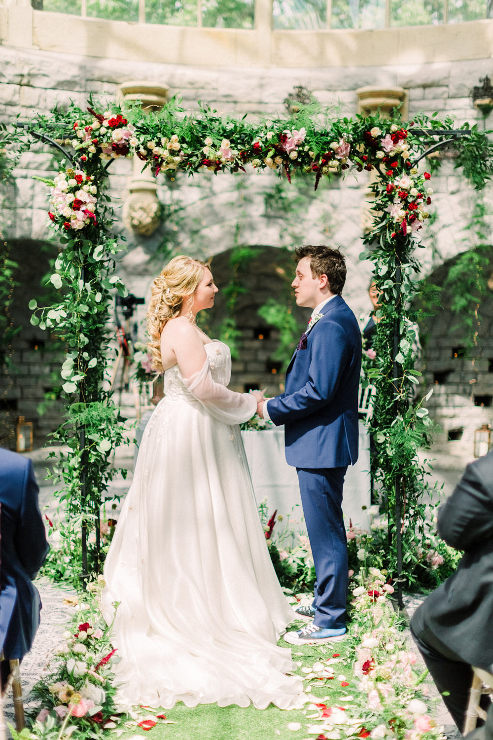 Flower Arch Backdrop Ceremony Aisle Greenery Petals Red Tortworth Court Wedding Sanshine Photography