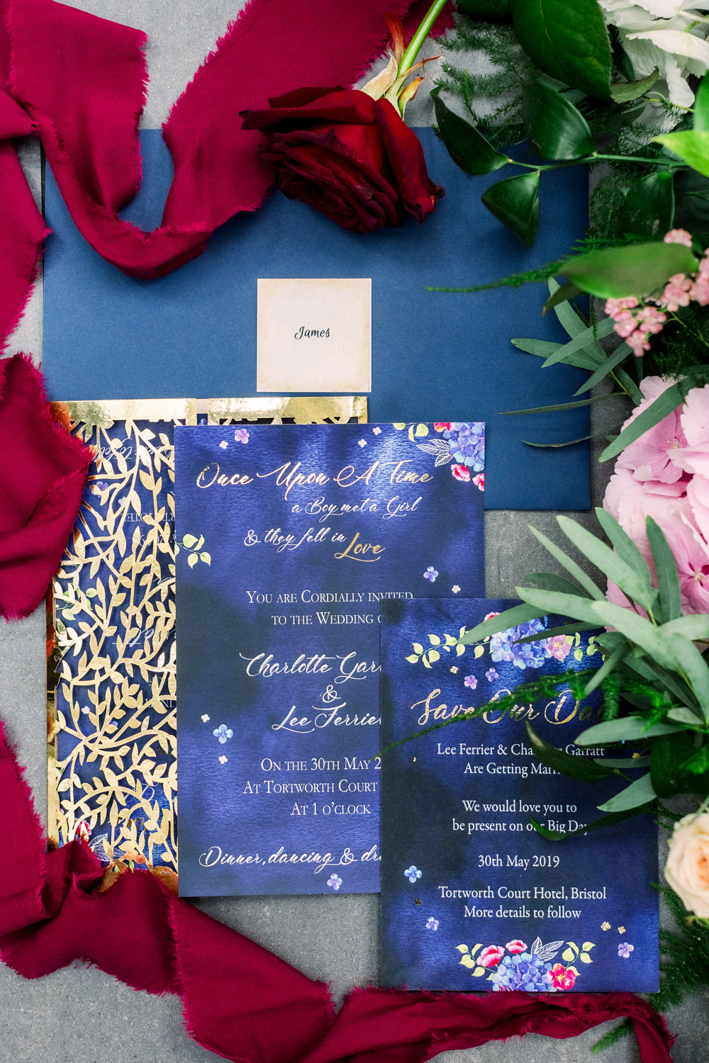 Stationery Invite Invitation Suite Flatlay Blue Floral Red Ribbon Gold Tortworth Court Wedding Sanshine Photography