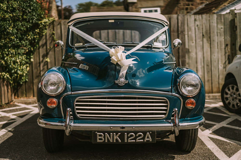 Car Transport Classic Morris Minor Crafty Village Hall Wedding Dot and Scolly Photography