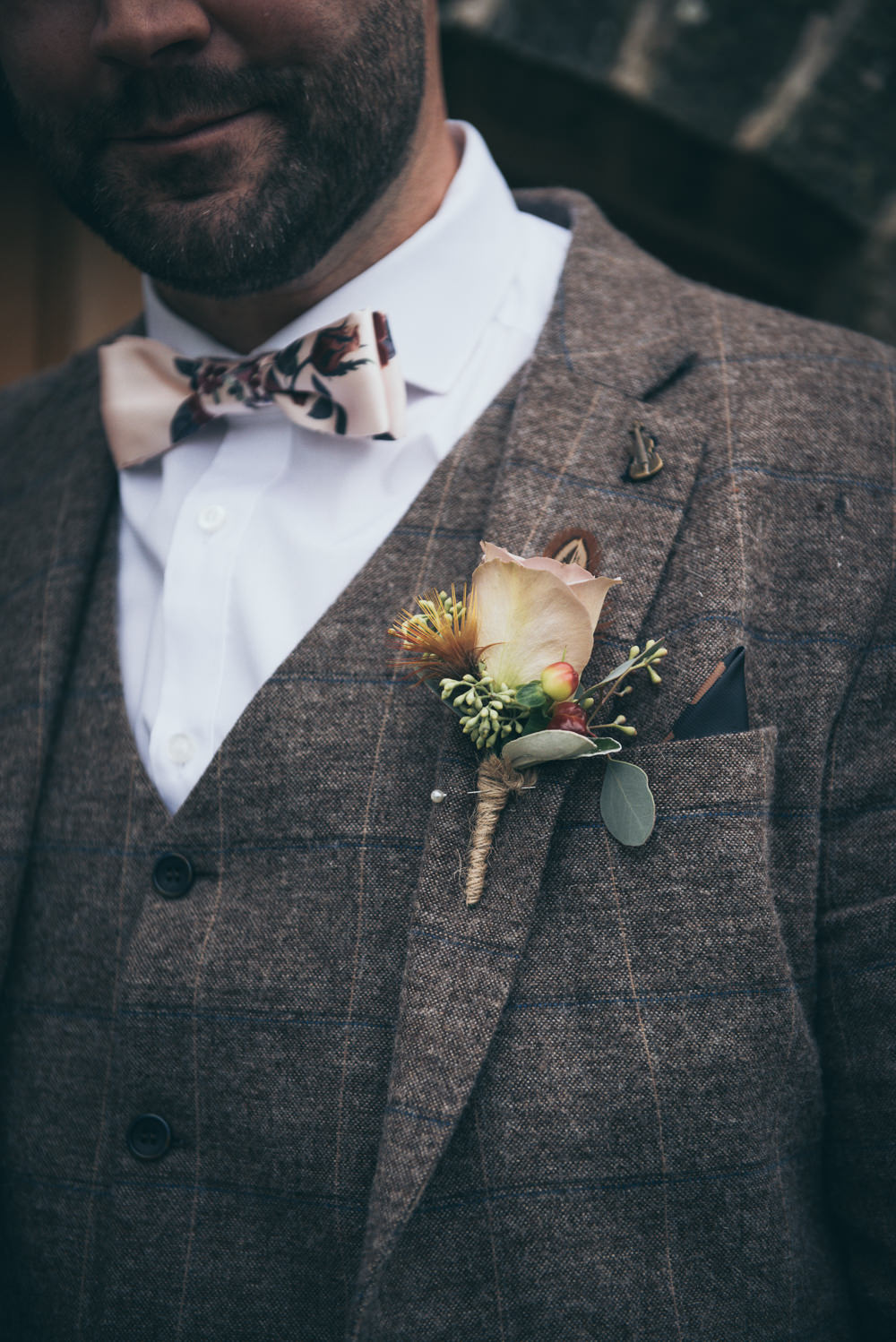 Groom Tweed Suit Brown Check Burgundy Chinos Floral Bow Tie Rose Buttonhole Fron Farm Yurt Retreat Wedding Cat Arwel Photography