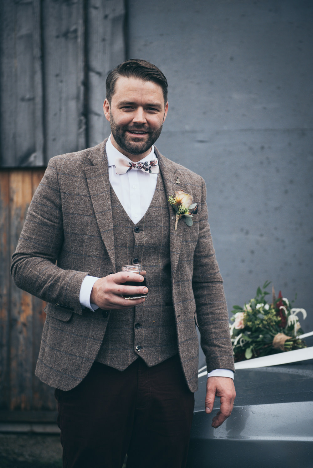 Groom Tweed Suit Brown Check Burgundy Chinos Floral Bow Tie Fron Farm Yurt Retreat Wedding Cat Arwel Photography
