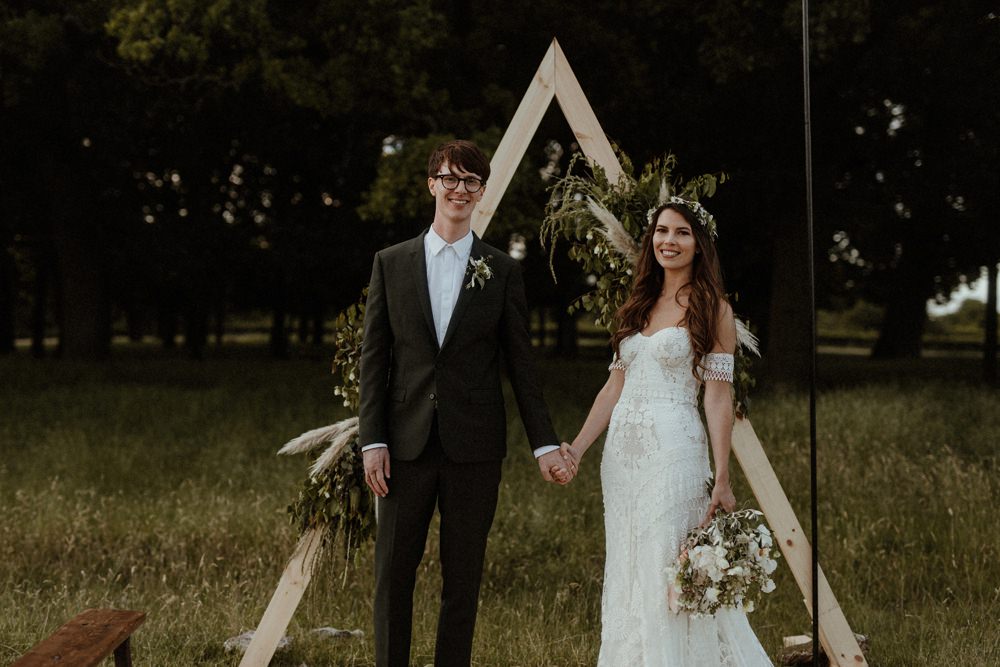 Backdrop Triangle Flowers Festoon Lights Backdrop Ceremony Outdoor Wedding UK Olivia and Dan Photography