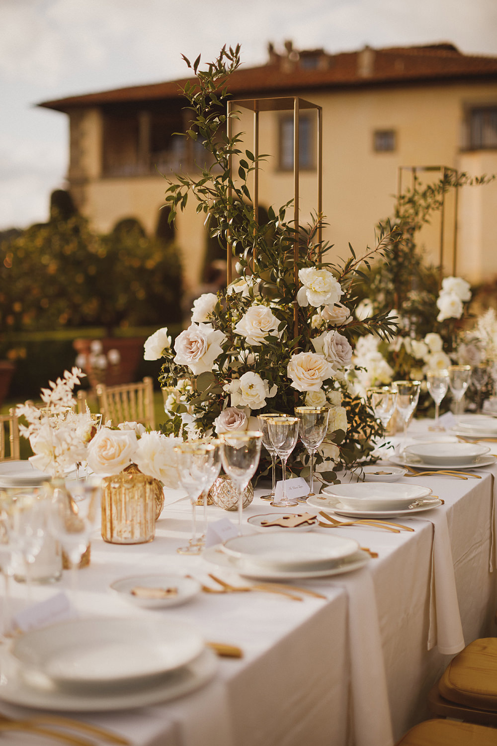 Table Centrepiece Tall Metal Flowers White Rose Astilbe Ranunculus Greenery Foliage Villa Gamberaia Wedding Ed Peers Photography