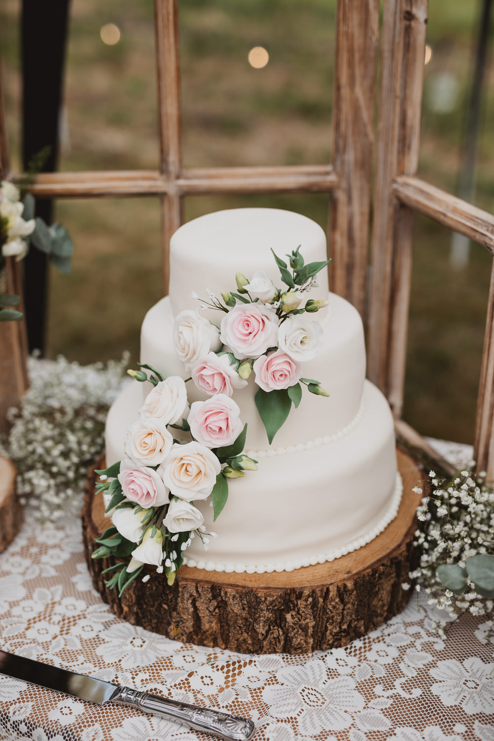 Iced Cake Sugar Flowers Log Slice Stand Clear Marquee Wedding Sarah Brookes Photography