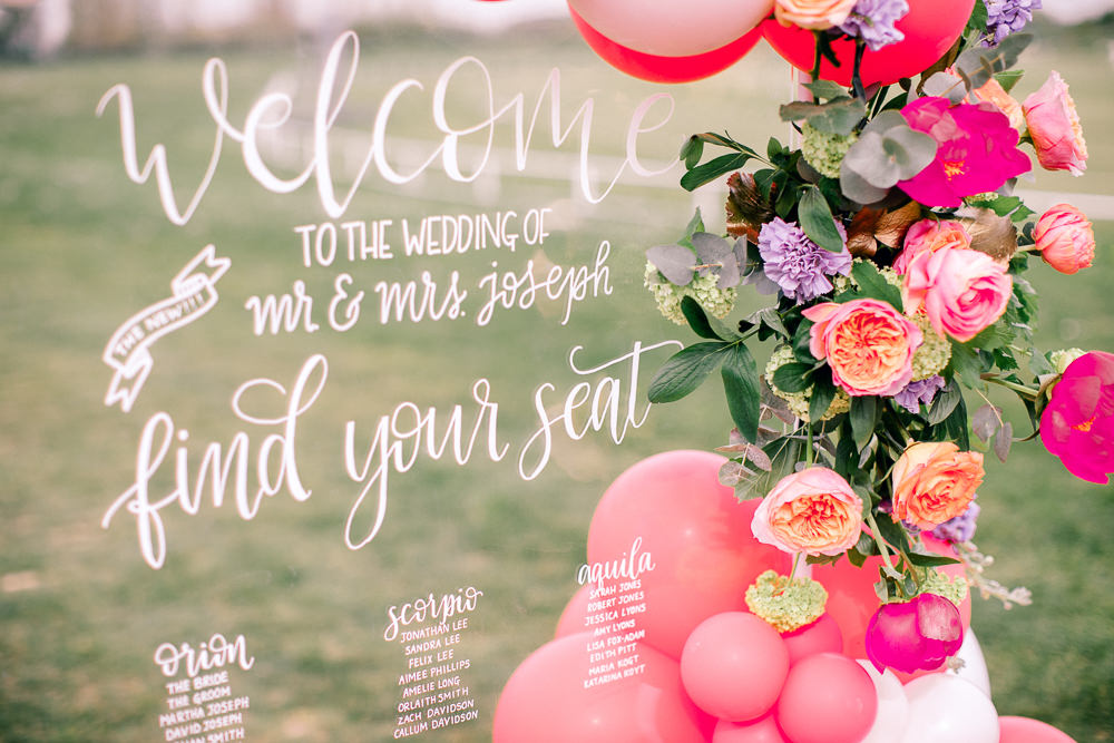 Clear Glass Acrylic Perspex Table Plan Seating Chart Calligraphy Flowers Balloons Coral Peach Wedding Ideas Courtney Dee Photography