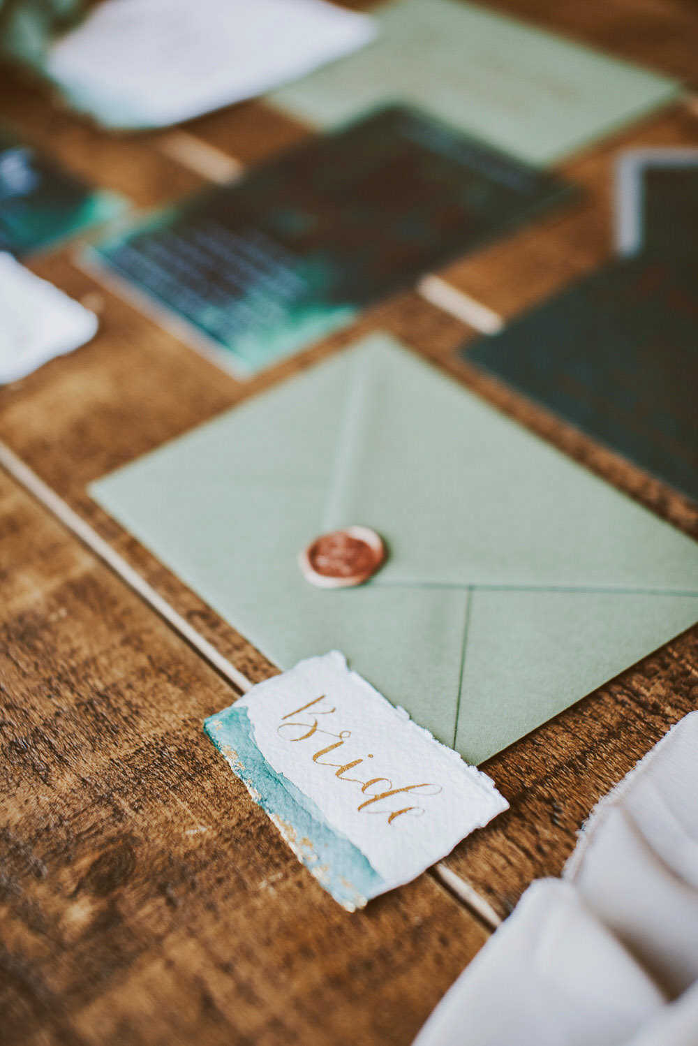 Stationery Suite Invitations Invite Flat Lay Calligraphy Wax Seal Envelope Green Gold Wedding Ideas Samantha Davis Photography